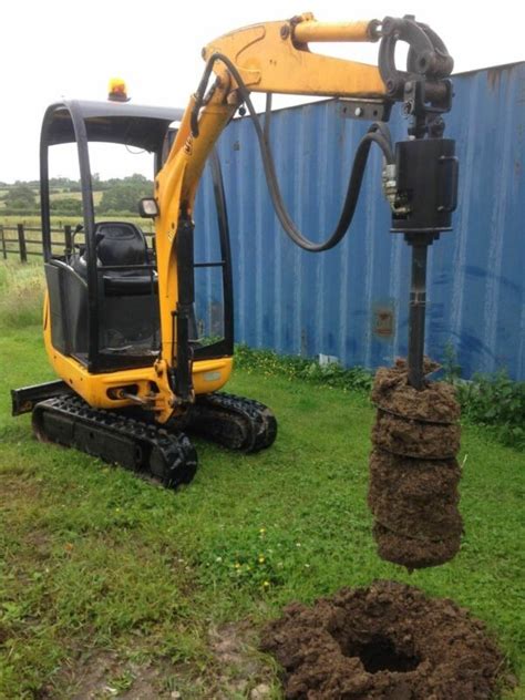 mini excavator post hole auger|auger attachments for mini excavators.